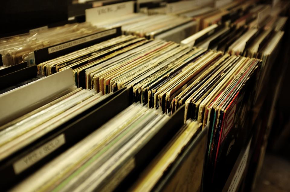 vinyl records collecting dust on shelf